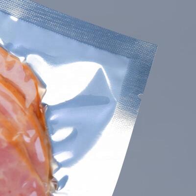 थोक वैक्यूम बैग हॉट सील कस्टम फ्रोजन फूड पैकेजिंग लेमिनेट प्लास्टिक बैग मीट पैकेजिंग के लिए