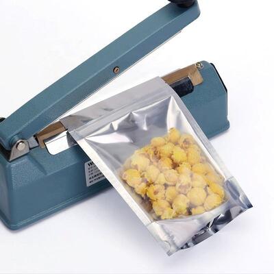 चमकदार पुनः प्रयोज्य टुकड़े टुकड़े एल्यूमीनियम पन्नी खाद्य वितरण ज़िपलॉक बैग यिन यांग खड़े हो जाओ बैग के साथ साफ सामने