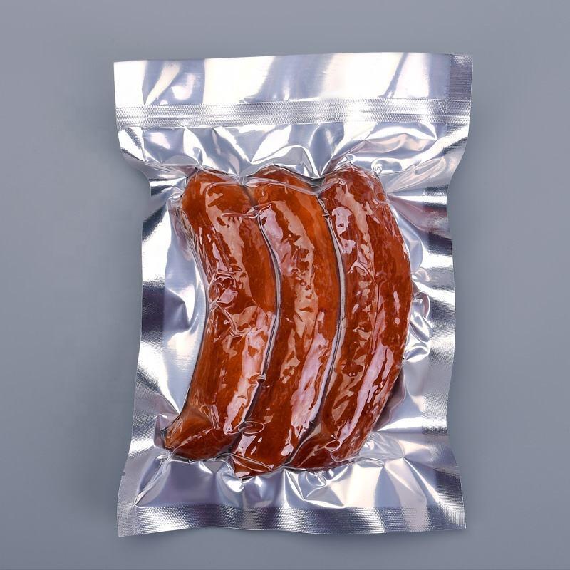 थोक वैक्यूम बैग हॉट सील कस्टम फ्रोजन फूड पैकेजिंग लेमिनेट प्लास्टिक बैग मीट पैकेजिंग के लिए